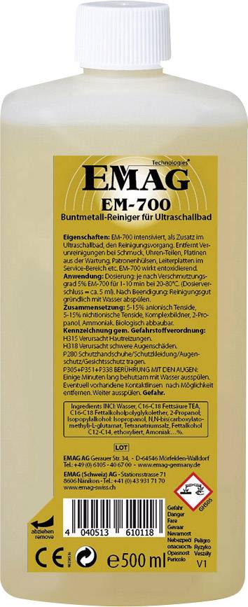 Bouteille avec étiquette du nettoyant EMAG EM-700 pour bains à ultrasons, 500 ml. Caractéristiques et consignes de sécurité au verso.