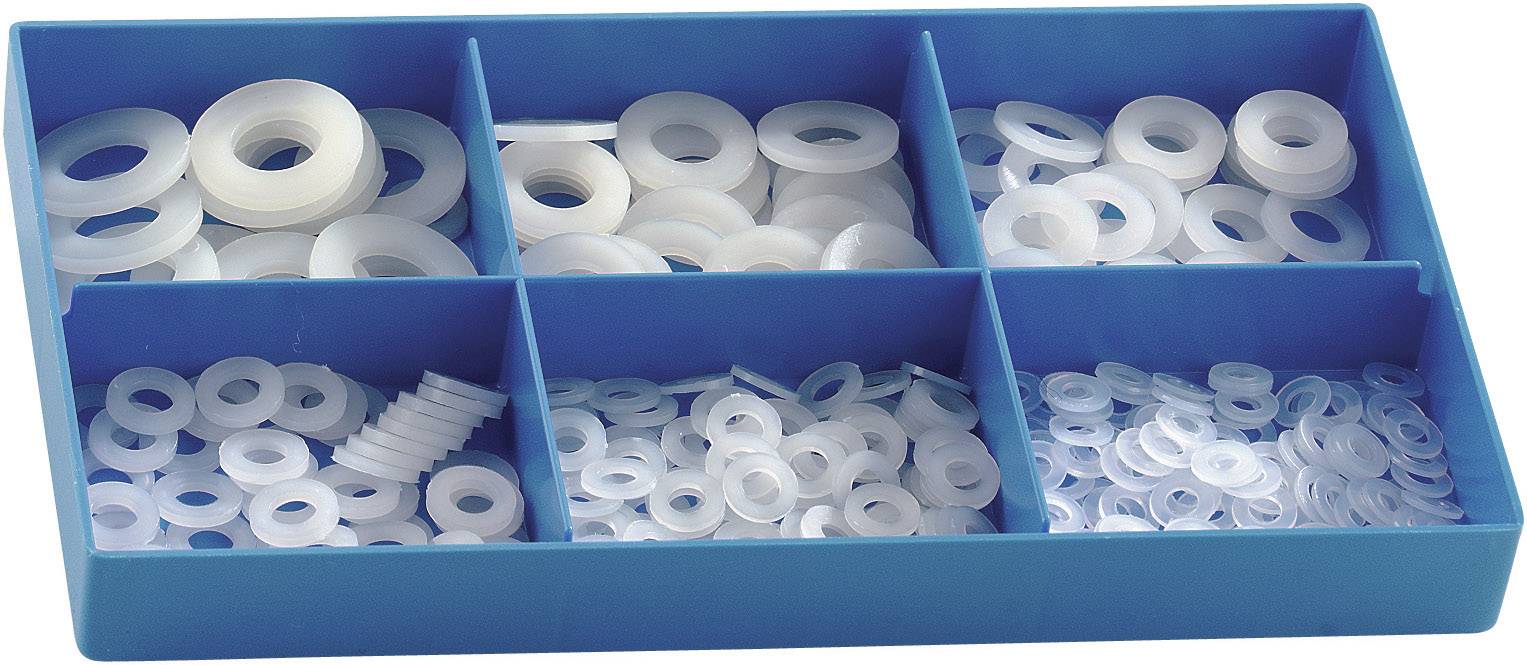Un organisateur bleu à six compartiments, rempli de différentes tailles de rondelles en plastique blanc.
