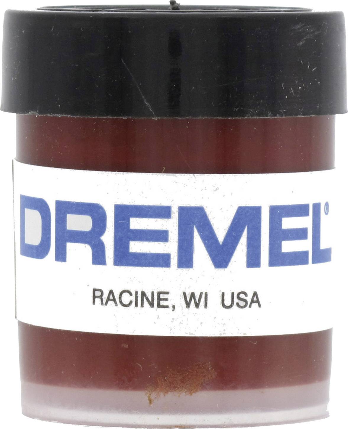 Petit conteneur rouge avec un couvercle noir, étiquette portant l'inscription « Dremel, Racine, WI États-Unis ».