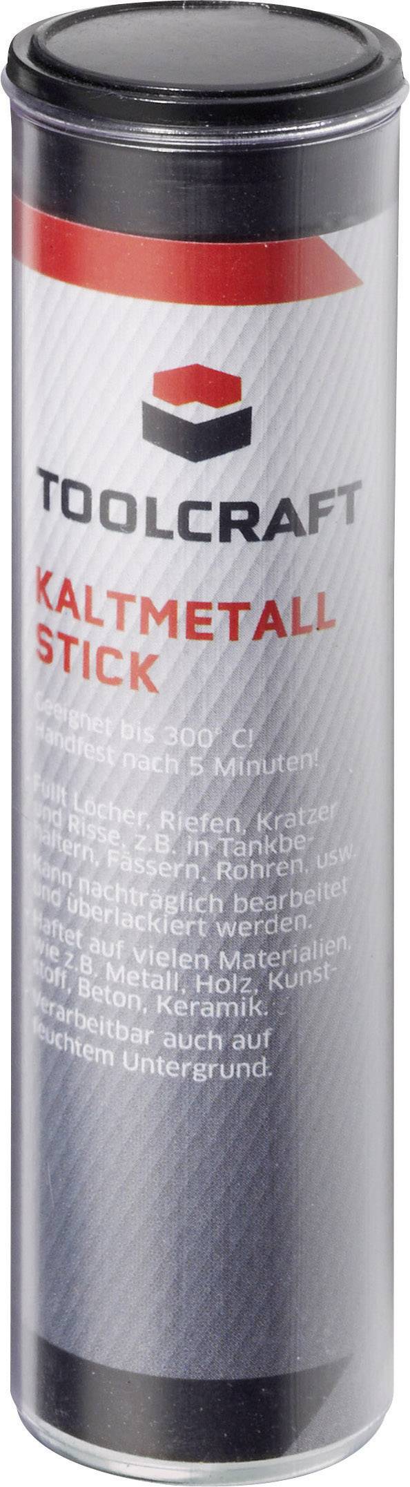 Une boîte à outils cylindrique de la marque Toolcraft, sur laquelle est inscrit 'Kaltmetall Stick'. Adaptée pour les réparations métalliques.