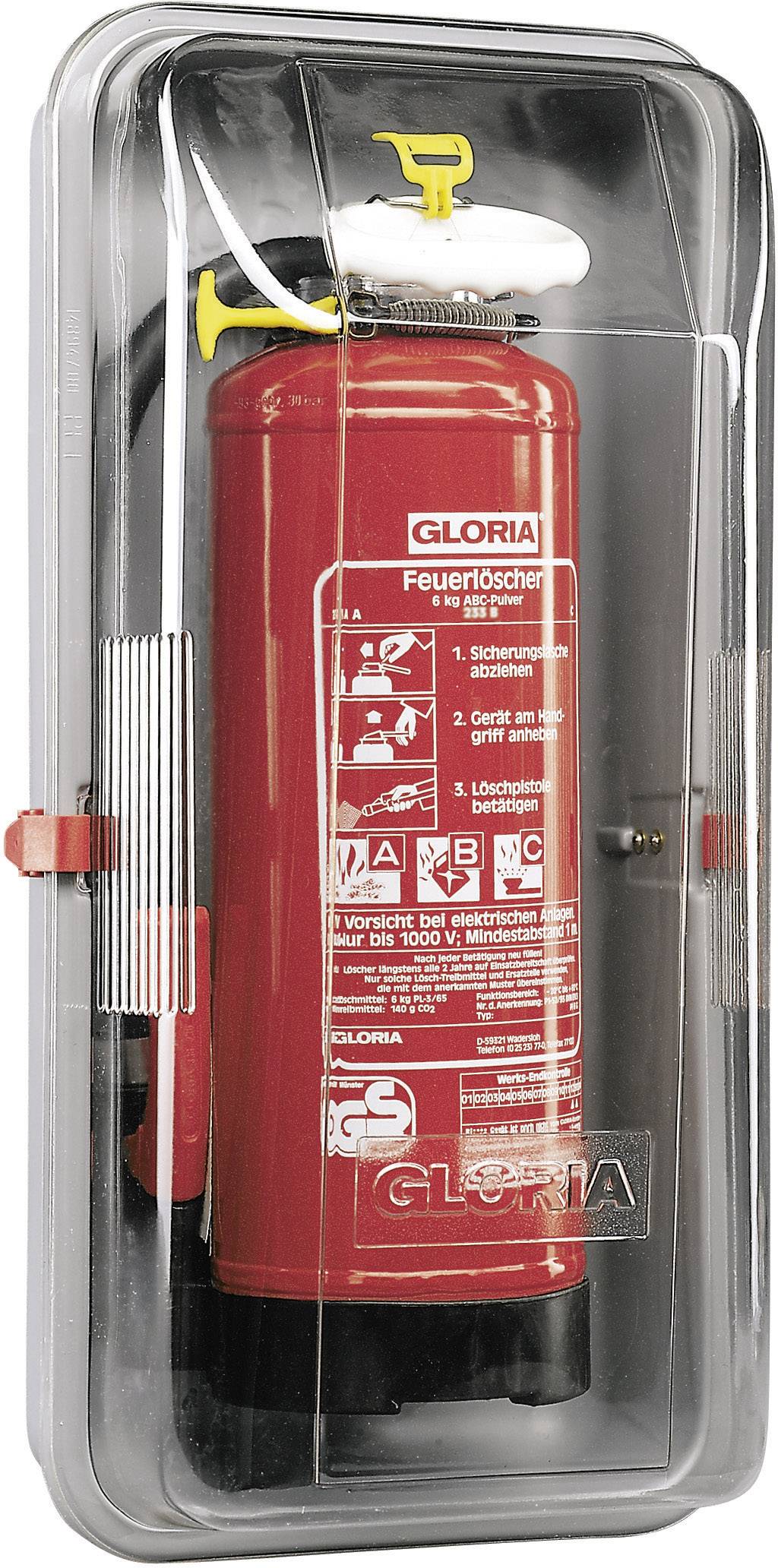 Extincteur rouge dans un boîtier en plastique transparent. Des instructions et des symboles sont visibles en haut.