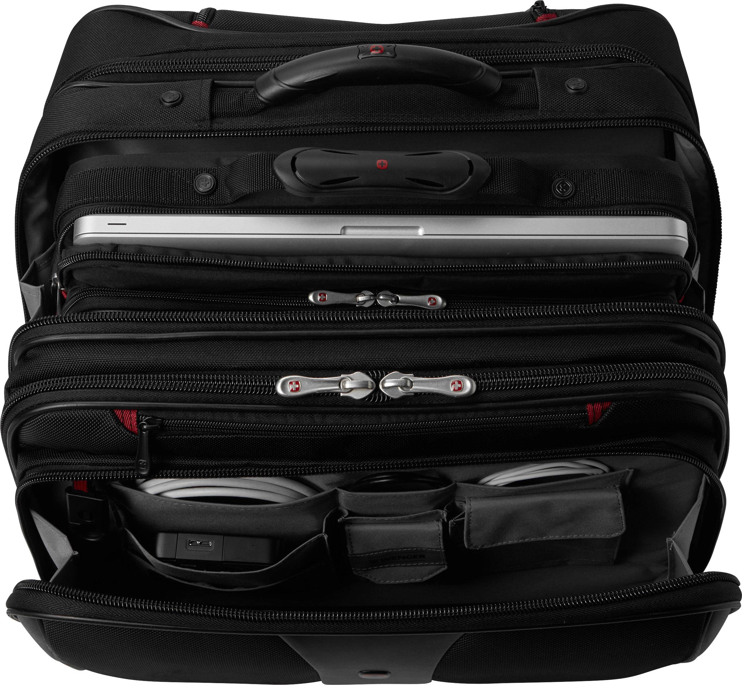 Sacoche noire ouverte avec compartiment pour ordinateur portable, plusieurs poches et fermetures à glissière ; le contenu est visible, notamment un ordinateur portable.