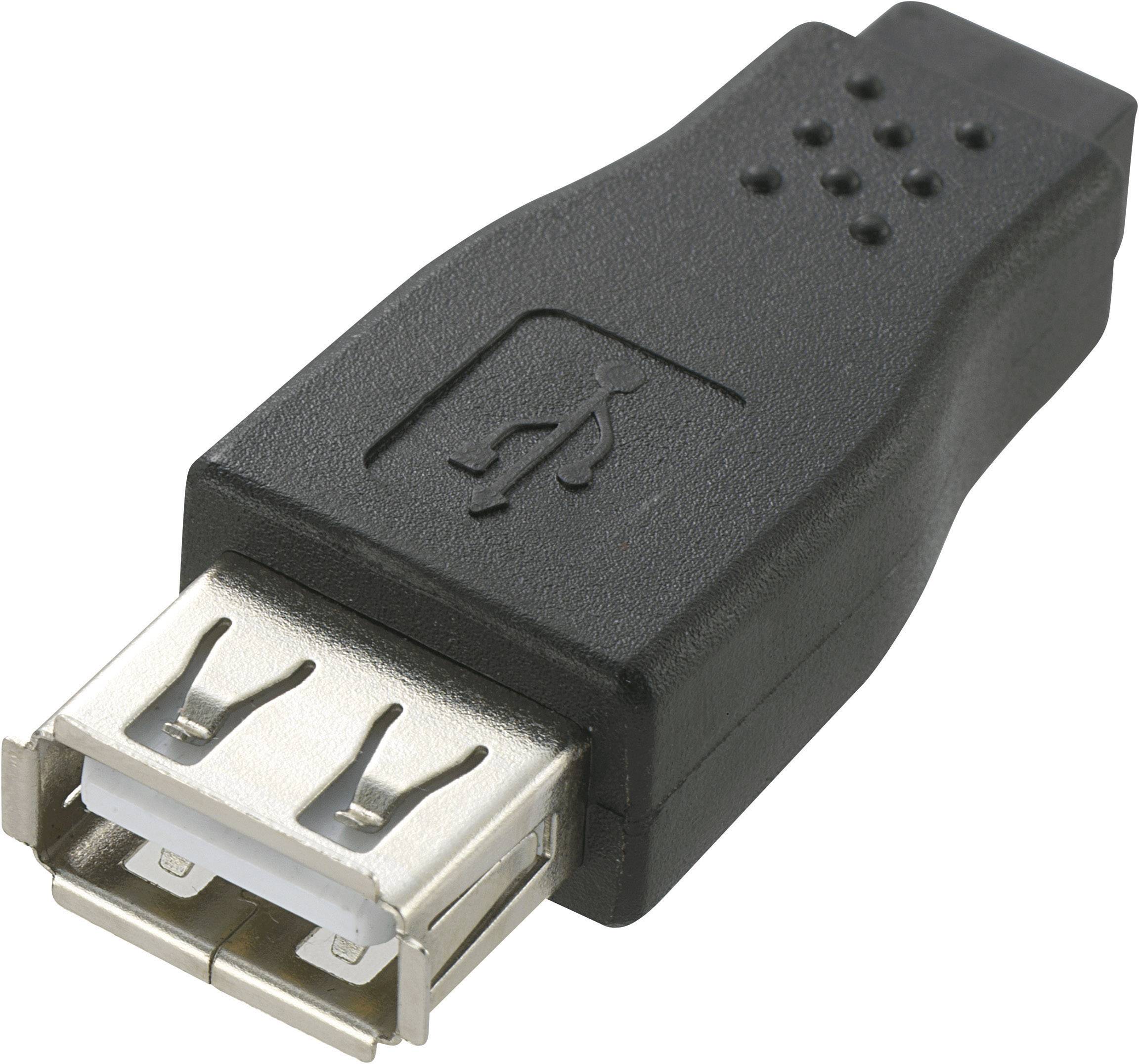 Un adaptateur USB noir avec un port USB standard. Utilisé pour connecter des appareils avec différents types d'USB.
