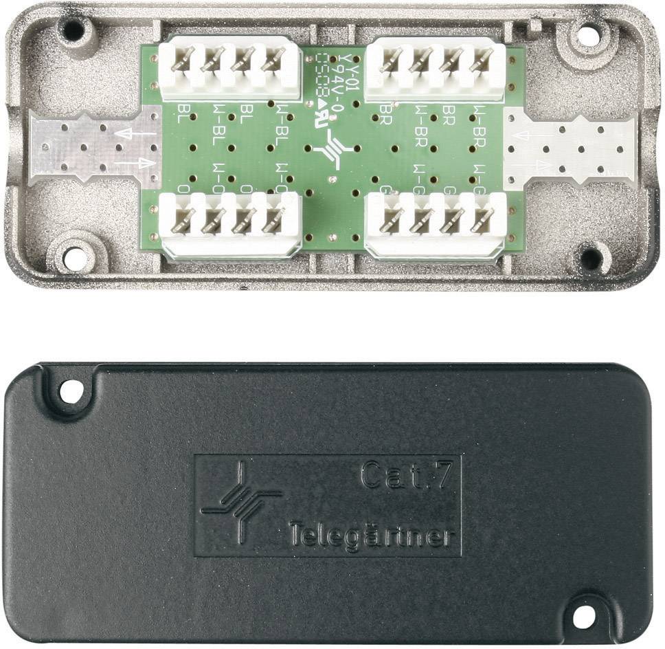 Répartiteur CAT7 'Telegärtner' avec circuit vert et boîtier argenté, housse de protection noire. Principalement utilisé pour les connexions réseau.